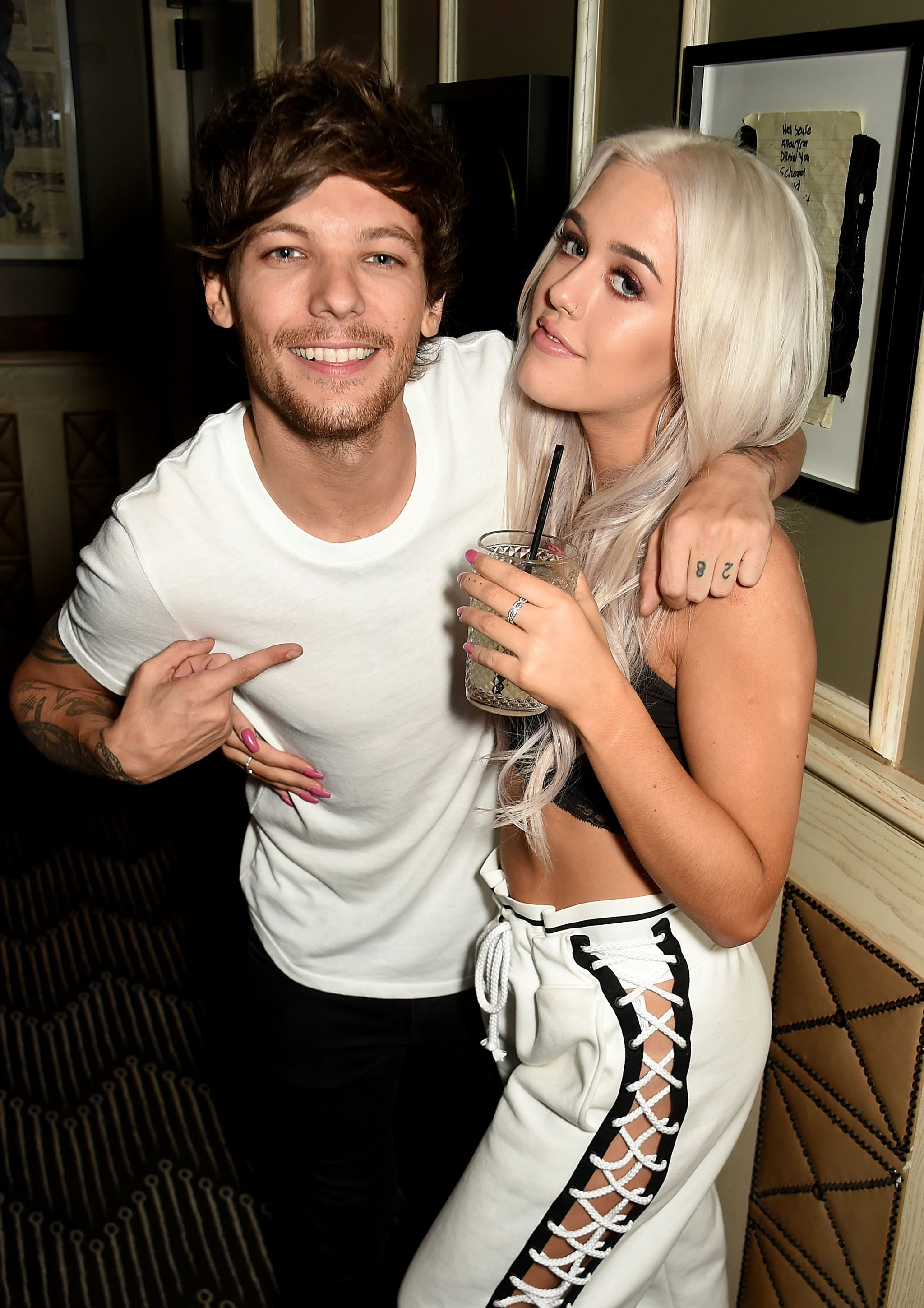 LONDON, ENGLAND - OCTOBER 25:  Lottie and Louis Tomlinson attend a party to launch her collection Nails Inc X Lips Inc Matchbox collection, at Tape London on October 25, 2016 in London, England.  (Photo by David M. Benett/Dave Benett/Getty Images for Nails Inc)