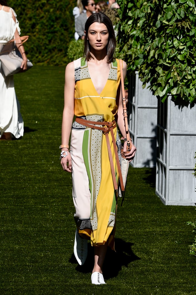 We think that Michelle would turn heads in this belted Tory Burch number.