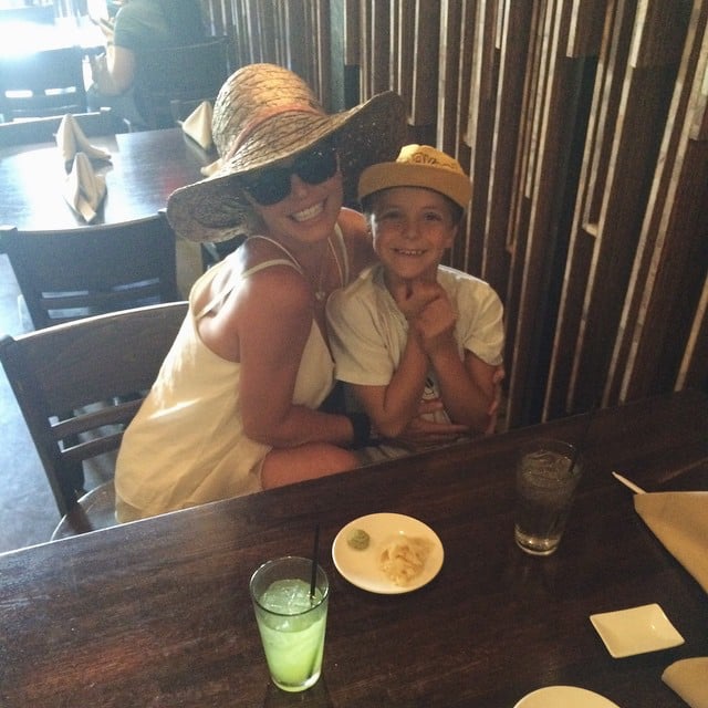 Britney held Jayden tight and smiled during a mom-and-son lunch in June 2015.