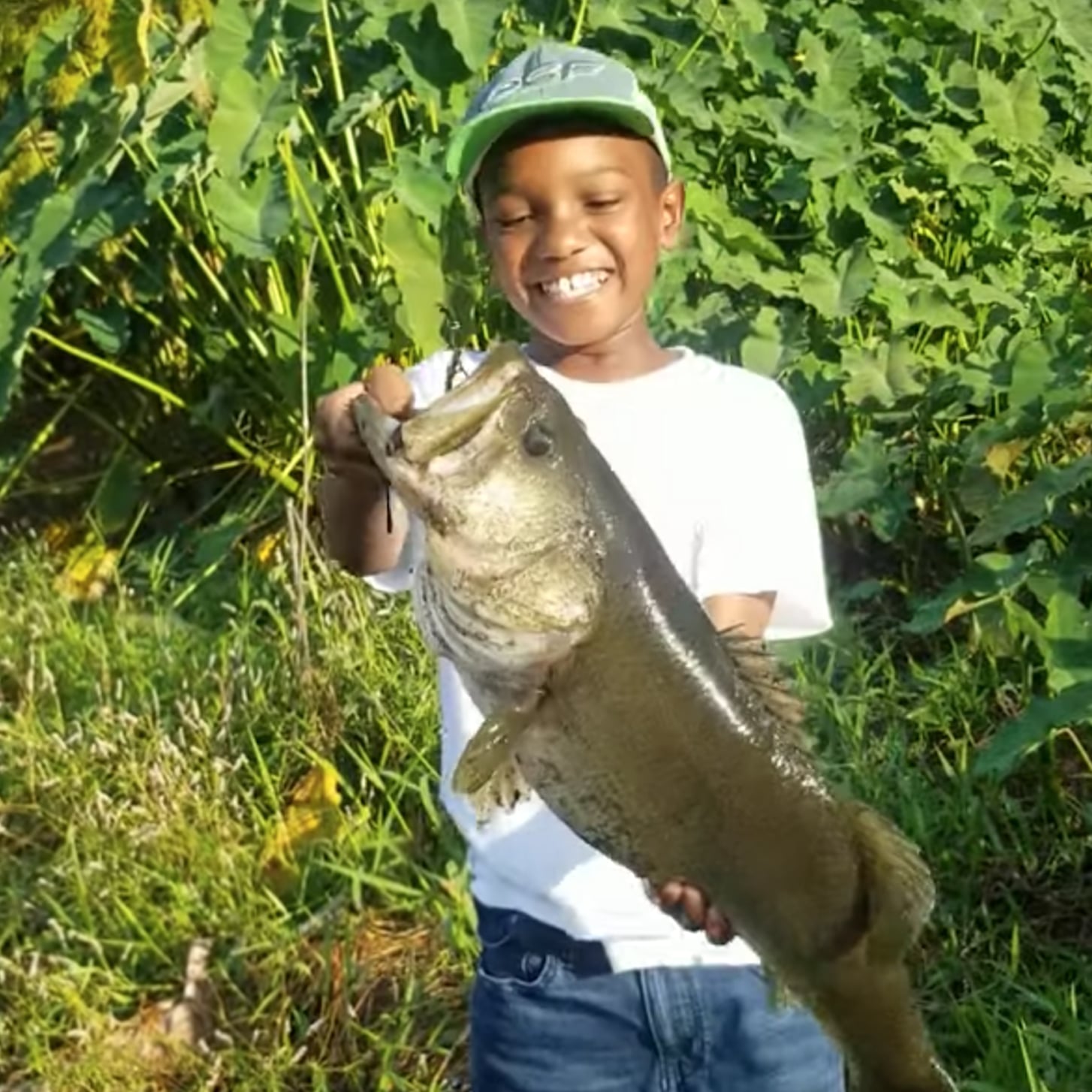 Viral Video of Little Boy Catching and Releasing a Fish