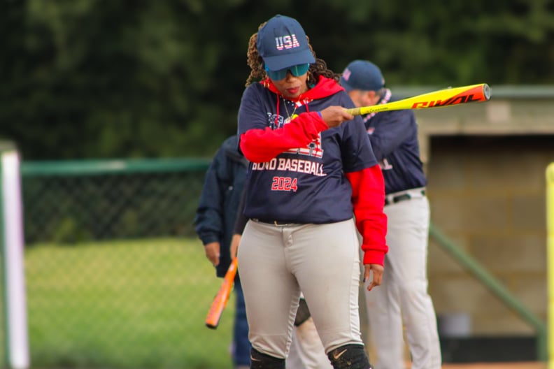 Kiana Glanton playing baseball.