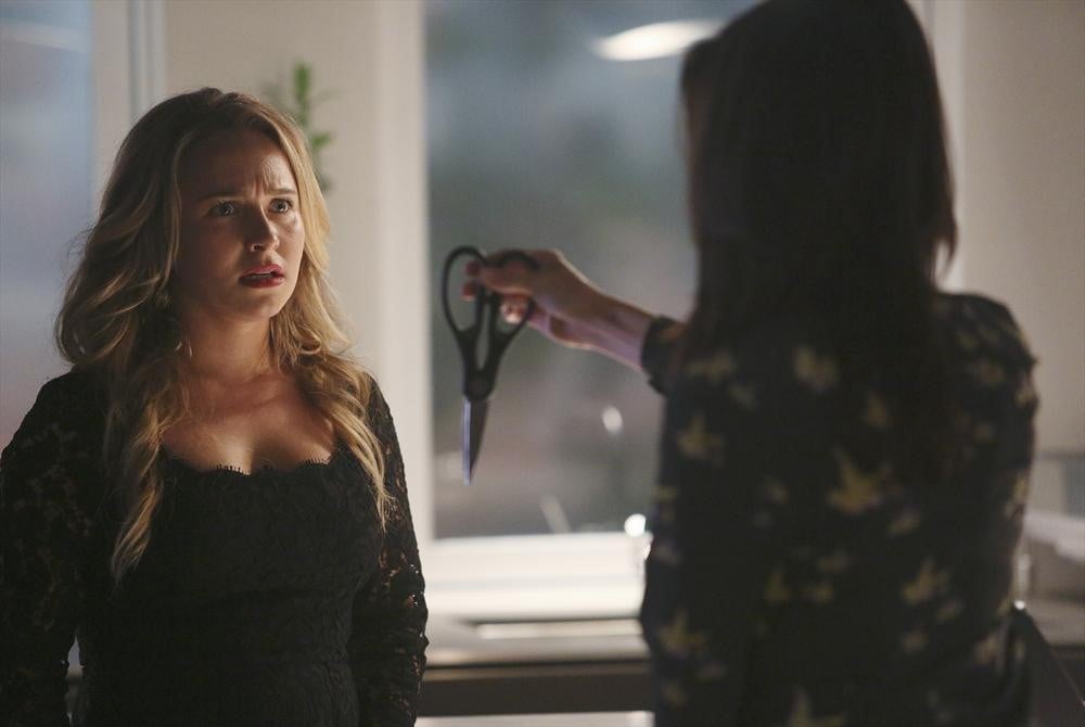 She hands over the scissors . . .