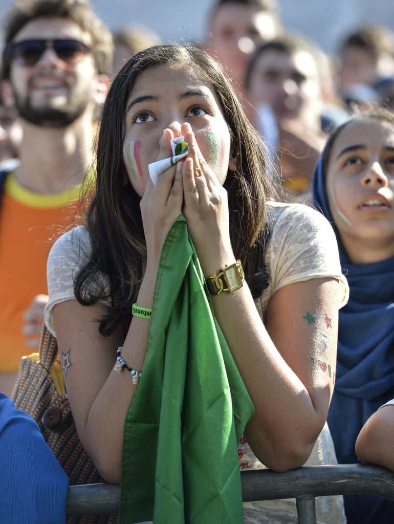 A fan of the Italian team looked anxious as she watched the game between Italy and Costa Rica.