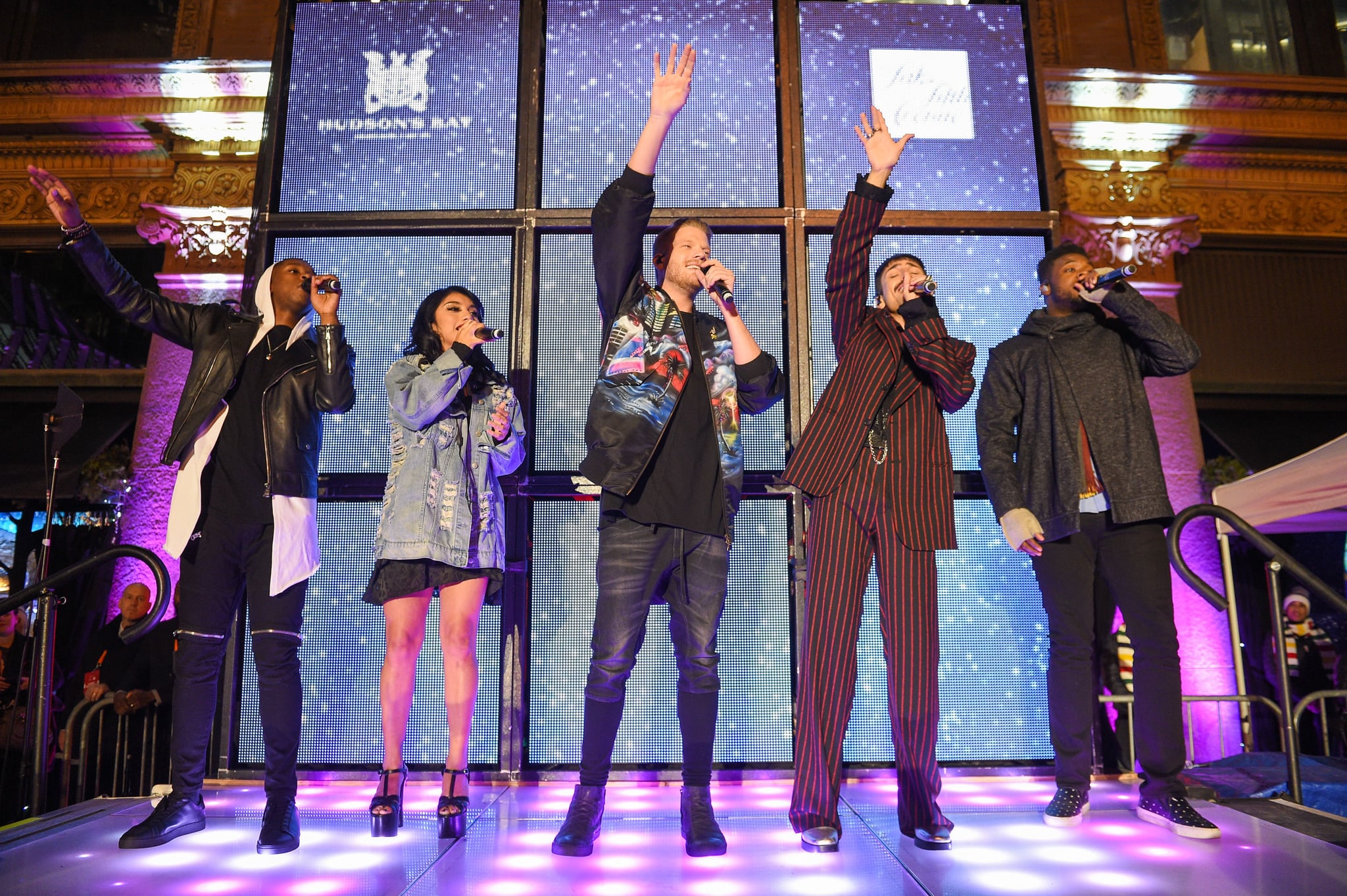 TORONTO, ON - NOVEMBER 02:  L-R Matt Sallee, Kirstin Maldonado, Scott Hoying, Mitch Grassi and Kevin Olusola of Pentatonix perform at Hudson's Bay And Saks Fifth Avenue Kick Off The Holidays With Pentatonix at Hudson's Bay on November 2, 2017 in Toronto, Canada.  (Photo by GP Images/WireImage)