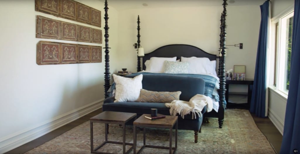 The master bedroom features a custom bed and pillows. The master bedroom features a custom bed and pillows.
