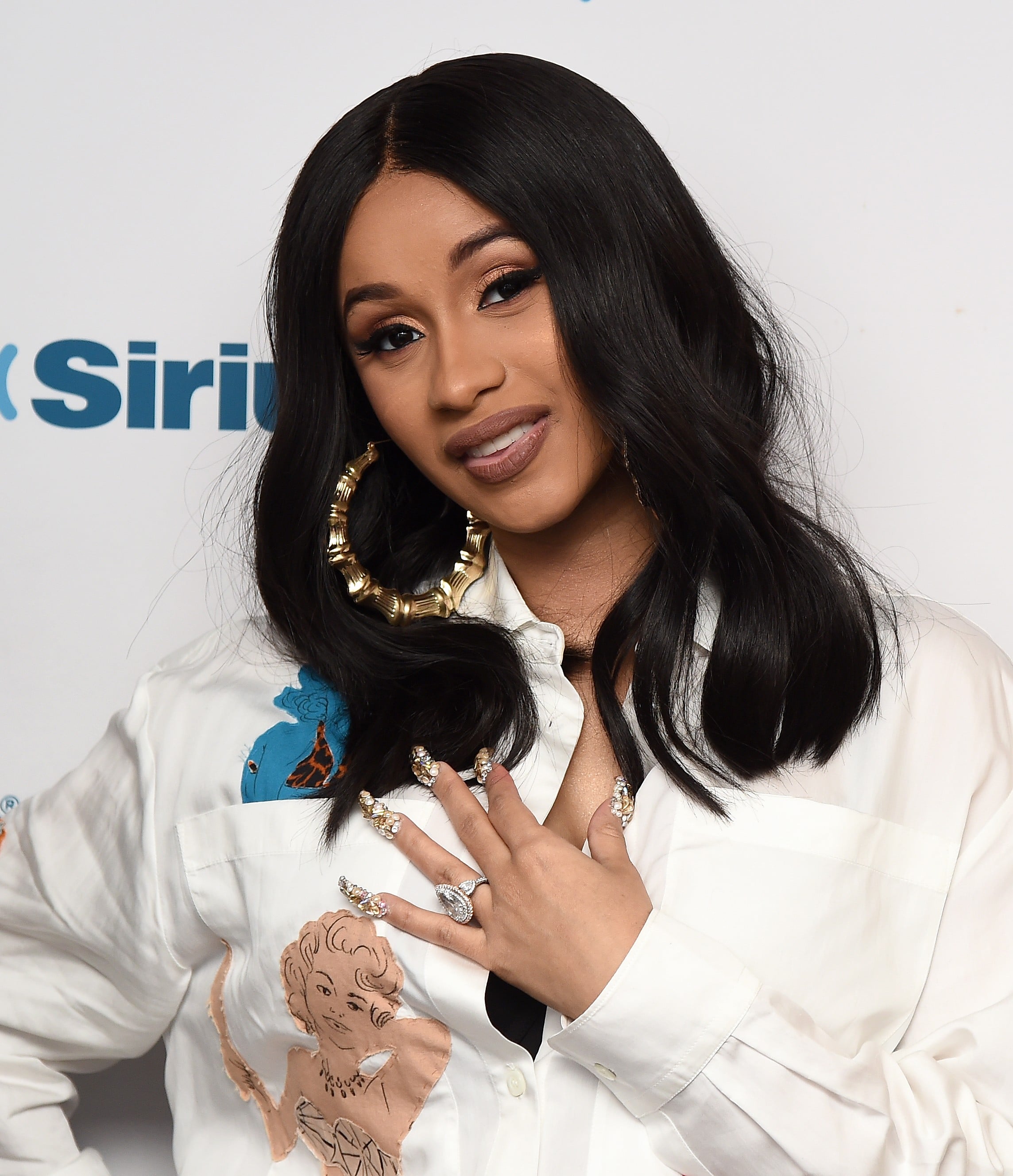 Cardi B Unboxes Elizabeth Taylor Fragrances POPSUGAR Beauty