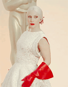At first, Lady Gaga was a little serious on the red carpet.