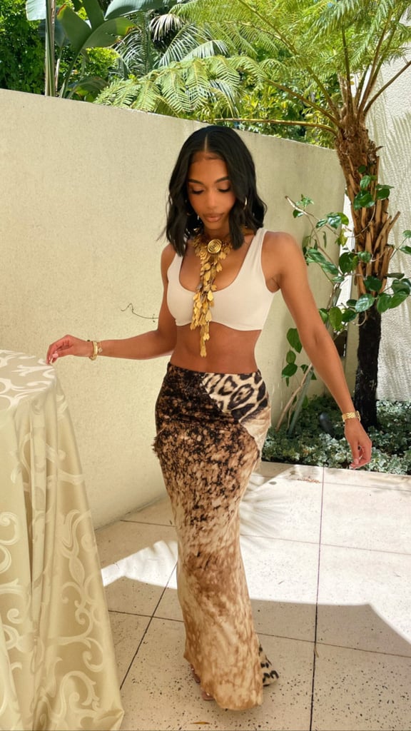 Lori Harvey Styles a White Bra With a Vintage Leopard Skirt