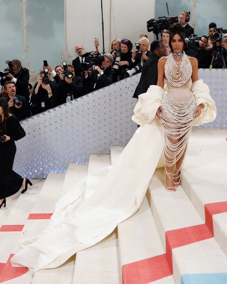 Kim Kardashian Out in Super Low-Cut Versace Gown for Met Gala