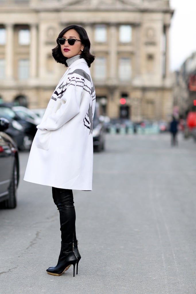 Pair Your Black Leggings With a Contrasted White Coat and a Bold Red Lip