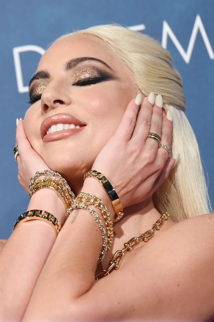 See All Angles of Lady Gaga's Sexy Red Versace Corset Dress