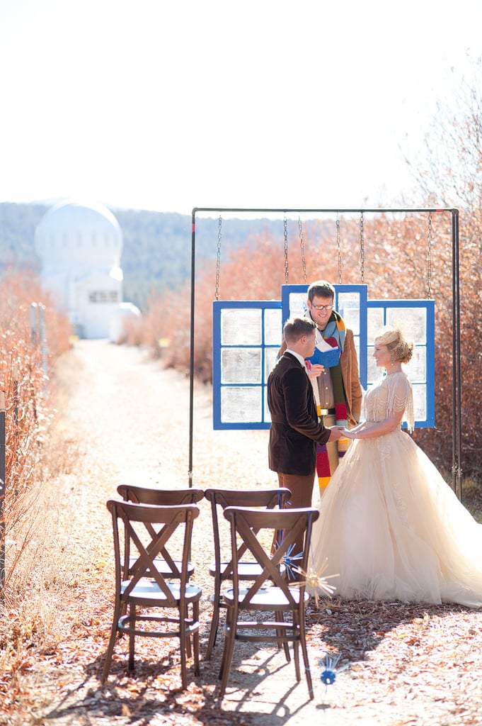 With an observatory setting the scene, the couple is married by an officiant clad in a Fourth Doctor scarf. 
Source: Candice Benjamin Photography