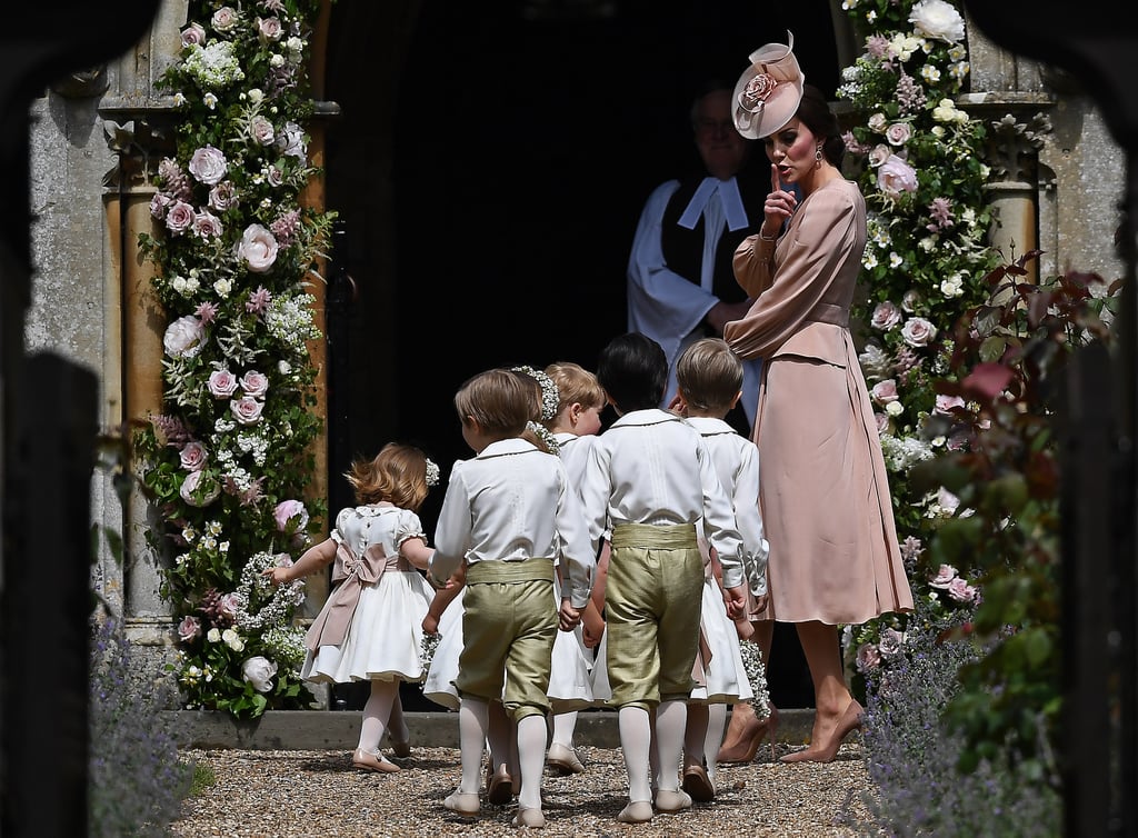 Kate returned the favor for her younger sister by keeping the pageboys and flower girls in line.