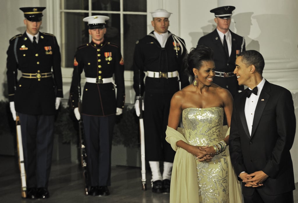 With members of the military standing guard, the new president and first lady looked crazy in love in 2009.