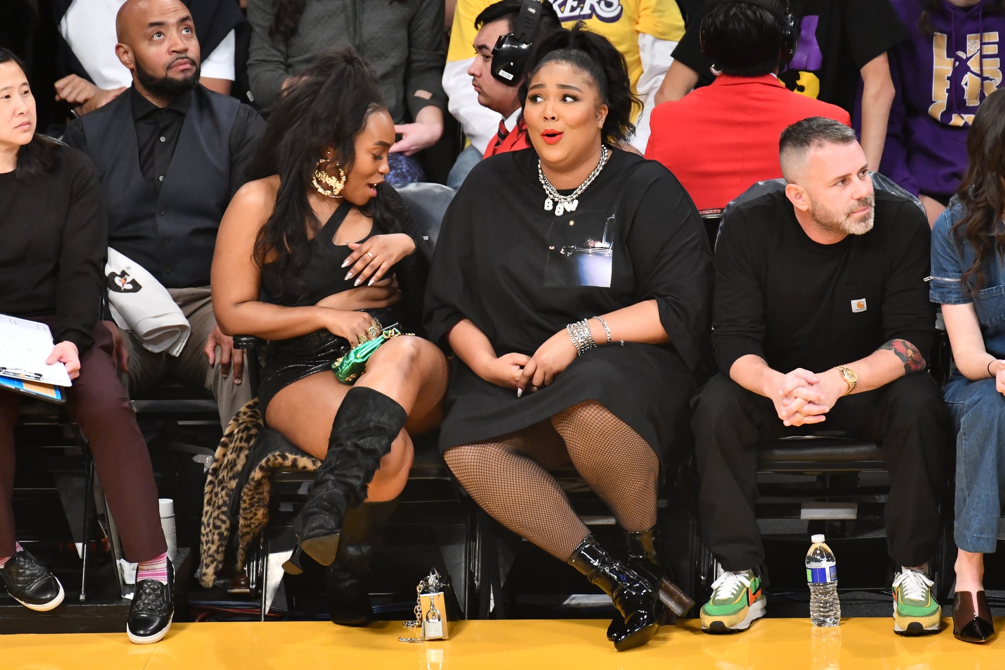 Asian lady courtside lakers