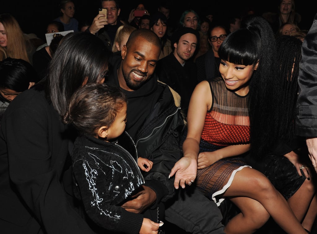 Nicki Minaj chatted with North West while sitting front row with Kanye West and Kim Kardashian at the Alexander Wang runway show.