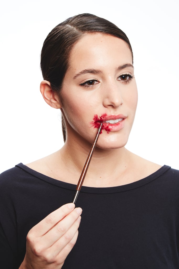 Apply the thick blood mixture using the end of your makeup brush, which is easier to wipe clean than the bristle side.