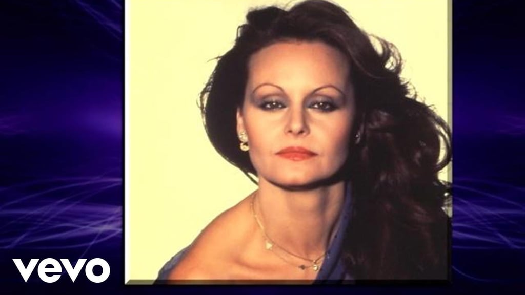 1989: "Como Tu Mujer" by Rocío Dúrcal