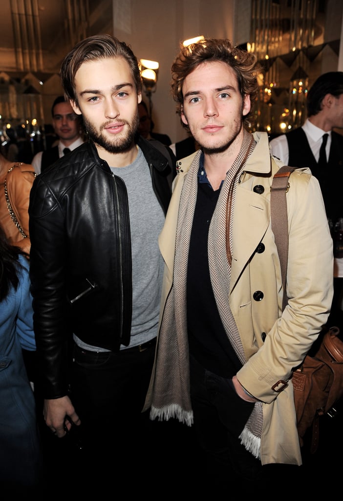 Douglas Booth and Sam Claflin stuck together at the Mulberry fashion show in February 2013.