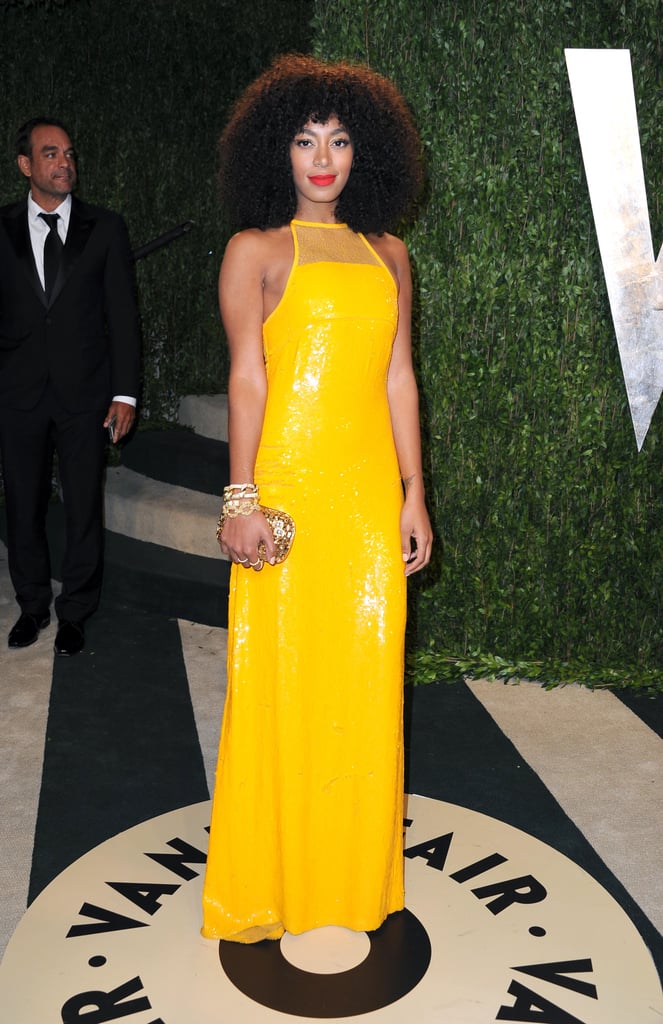 For Vanity Fair's 2013 Oscars afterparty, Solange truly sparked in a yellow sequined Emilio Pucci gown, which she accessorized with a few chunky gold jewels for a touch of edge.