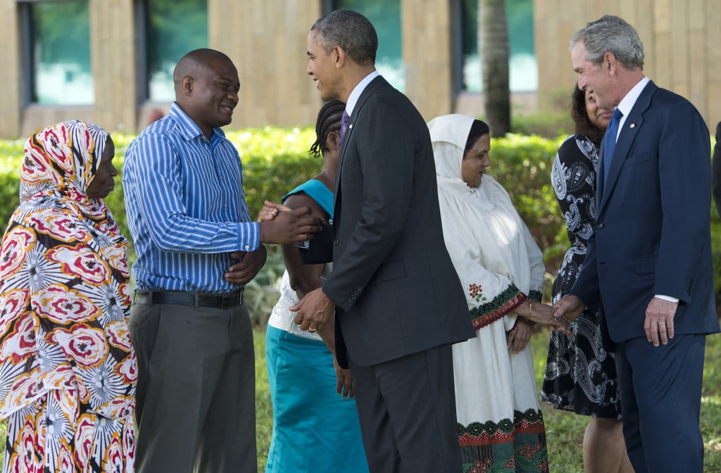 In July 2013, President Obama and former President George W. Bush greeted the family members of victims of the 1998 US Embassy bombing in Dar es Salaam, Tanzania.