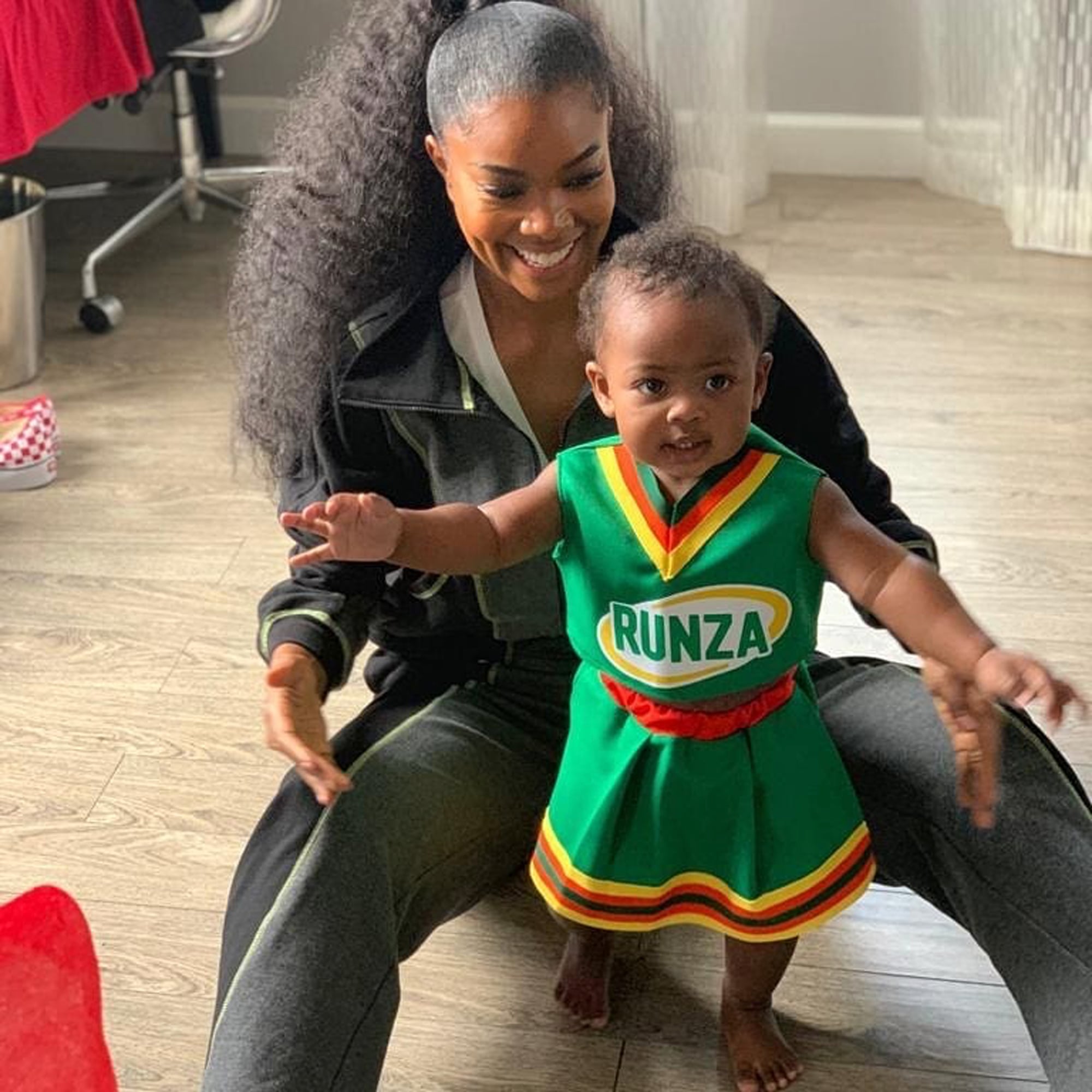 Gabrielle Union S Picture Of Kaavia In Bring It On Outfit Popsugar Family