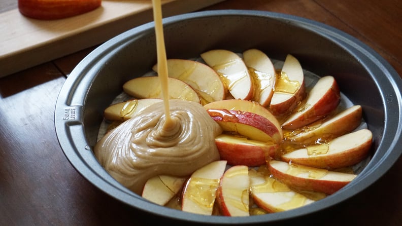 apple honey upside down cake for rosh hashanah dessert: pouring in batter