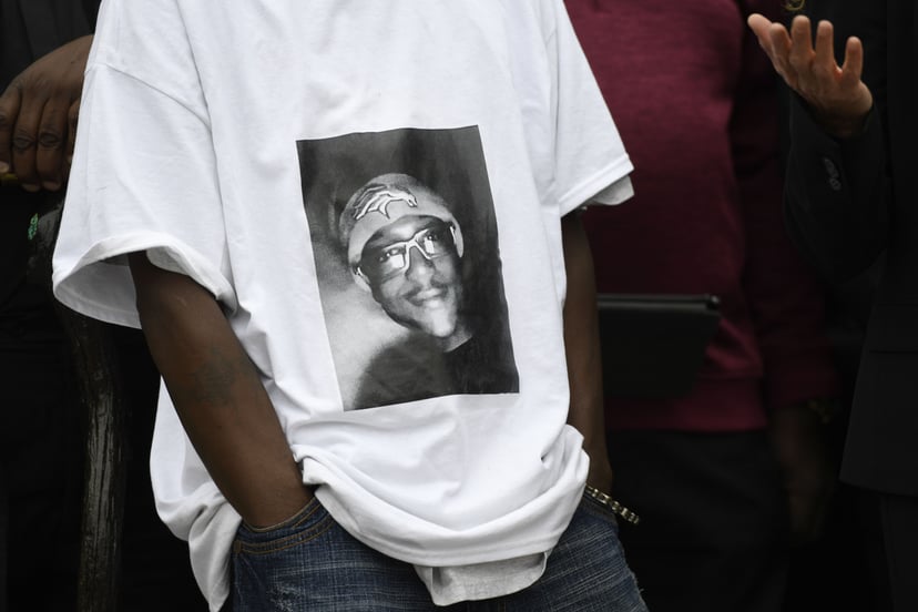 AURORA, CO - OCTOBER 01: LaWayne Mosley, father of Elijah McClain, wears a t-shirt with is son's picture on it during a press conference in front of the Aurora Municipal Center October 01, 2019. Family, friends, legal counsel, local pastors and community 
