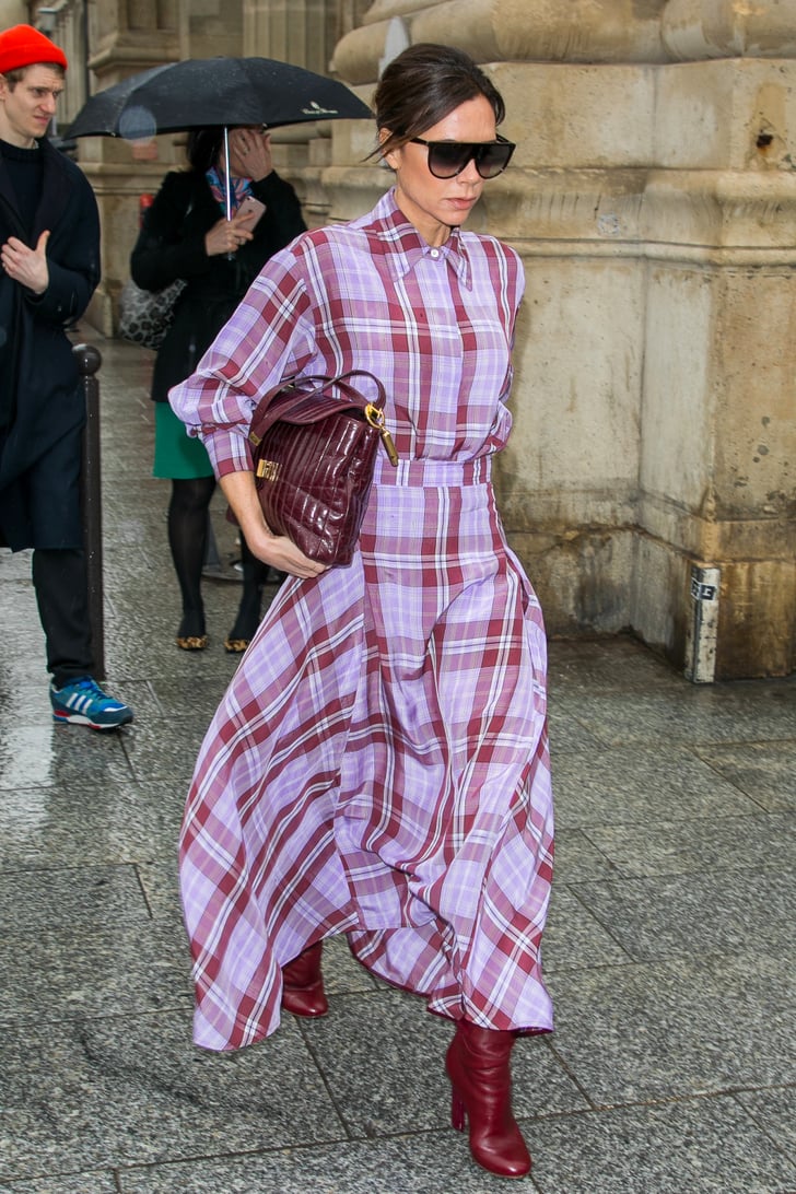 Victoria Beckham Wearing Purple Plaid Outfit With Red Boots