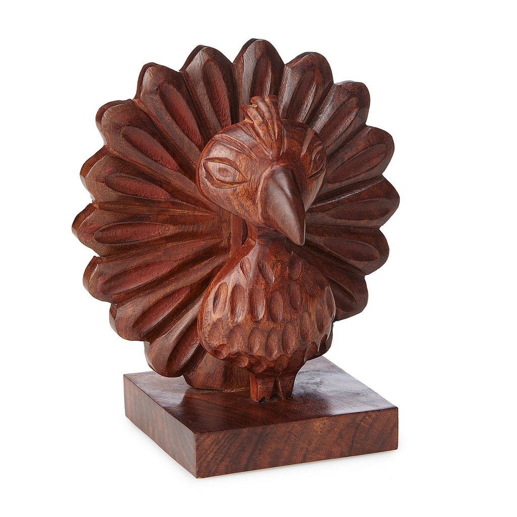 Uncommon Goods Perry the Carved Peacock Eyeglasses Holder ($28)