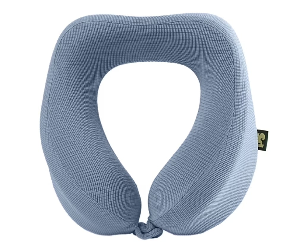Popsugar Travel Neck Pillow ($20)
It's the small things that make a chaotic travel day feel more relaxing, and that starts with having the right accessories. This memory foam neck pillow maximizes comfort on any form of transportation and has a machine-washable cover for easy care. Pair it with the Popsugar Passport Holder ($18) for the dad who's always double-checking he has everything he needs. Together, they make the ultimate foolproof travel kit.