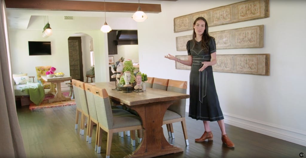 The dining room table has a worn-in feel to it. Oh, and there are more of those painted wooden panels on the wall! The dining room table has a worn-in feel to it. Oh, and there are more of those painted wooden panels on the wall!