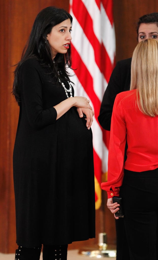 A pregnant Abedin continued to work for Hillary in December 2011.