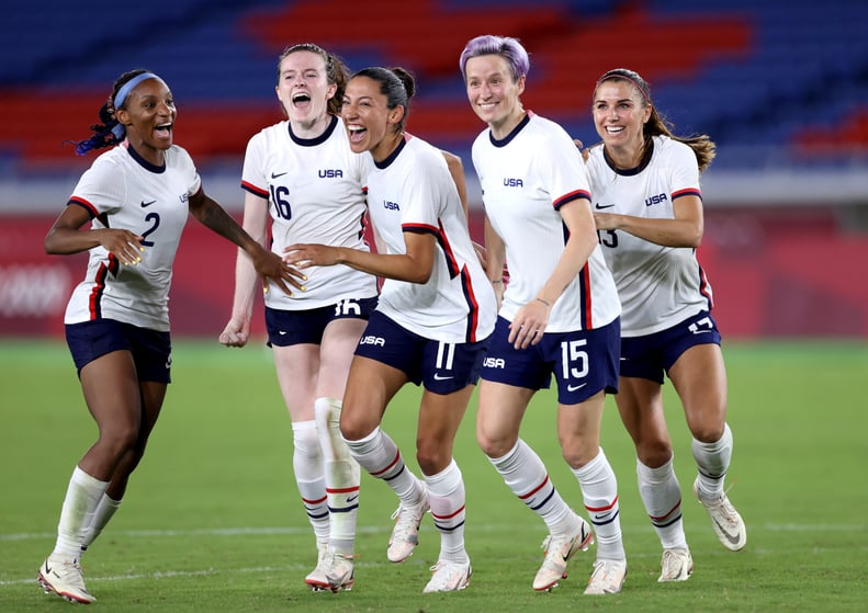 YOKOHAMA, JAPAN - JULY 30: Crystal Dunn #2, Rose Lavelle #16, Christen Press #11, Megan Rapinoe #15 and Alex Morgan #13 of Team United States celebrate following their team's victory in the penalty shoot out after the Women's Quarter Final match between N