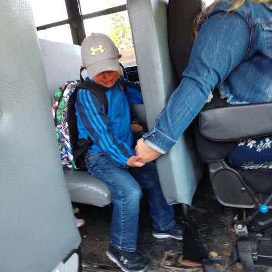 Bus Driver Holds Student's Hand on First Day of School