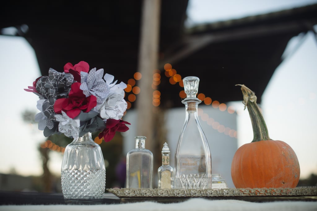 A small pumpkin and potions bottles are a pretty and simple way to play up the theme.