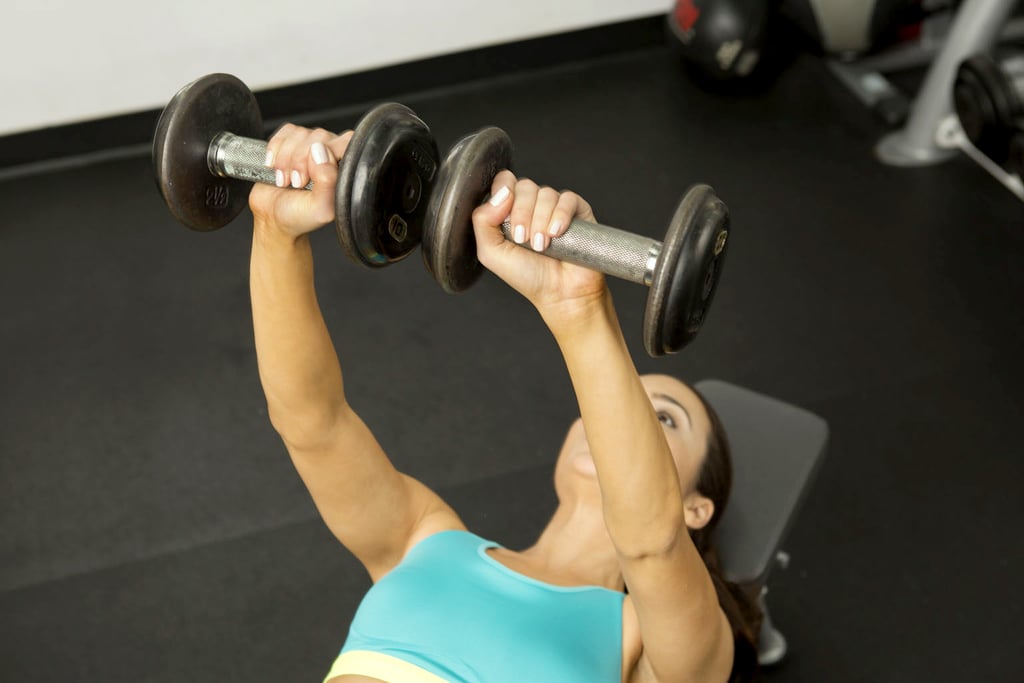 woman lifting weights