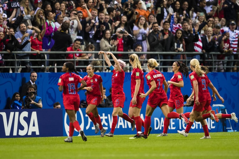REIMS, FRANCE - JUNE 11: The American Squad celebrates their victory during the 2019 FIFA Women's World Cup France group F match between USA and Thailand at Stade Auguste Delaune on June 11, 2019 in Reims, France. (Photo by Marcio Machado/Getty Images)