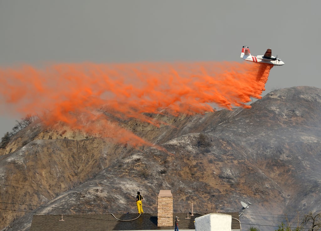 A helicopter flew above the affected hills.