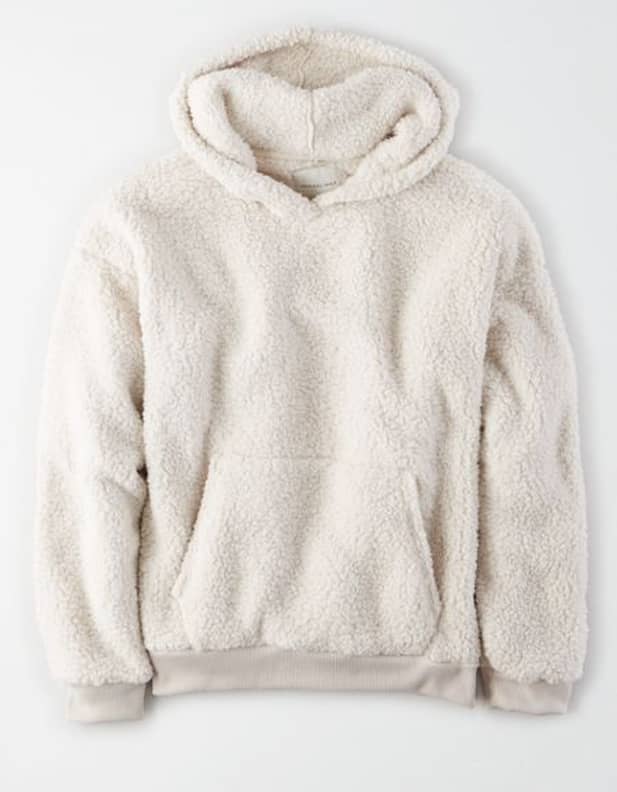 White fuzzy shop sweatshirt
