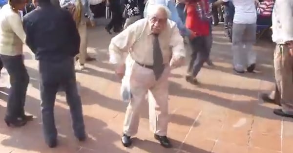 old man dancing with canes