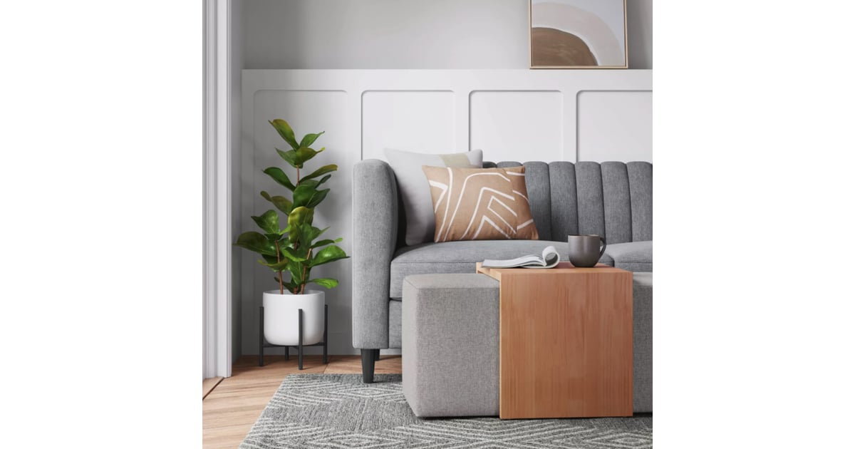 Cocktail ottoman with waterfall table top
