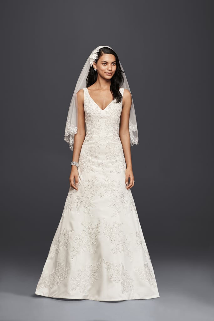 Oleg Cassini V-Neck Lace A-Line Wedding Dress ($1,358)