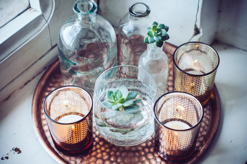 Over flowers? Pair candles with succulents and keep the arrangement near a window.
