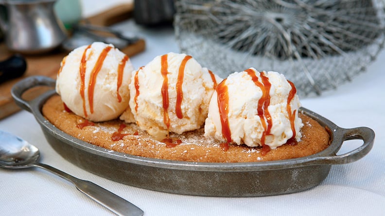 Sugar cookie skillet dusted with powdered sugar and a cinnamon-orange mulling spice