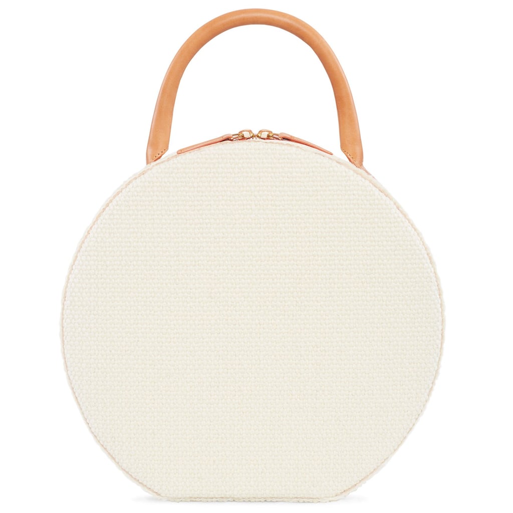 "Mansur Gavriel is churning out its circle bags in textured styles, and this cream boucle option ($1,350) just screams Summer. I can picture wearing it with both floaty maxi dresses and casual little rompers alike." — SW