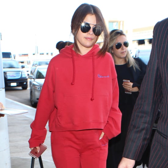 Selena Gomez Wearing Red Sweatpants and Heels at the Airport