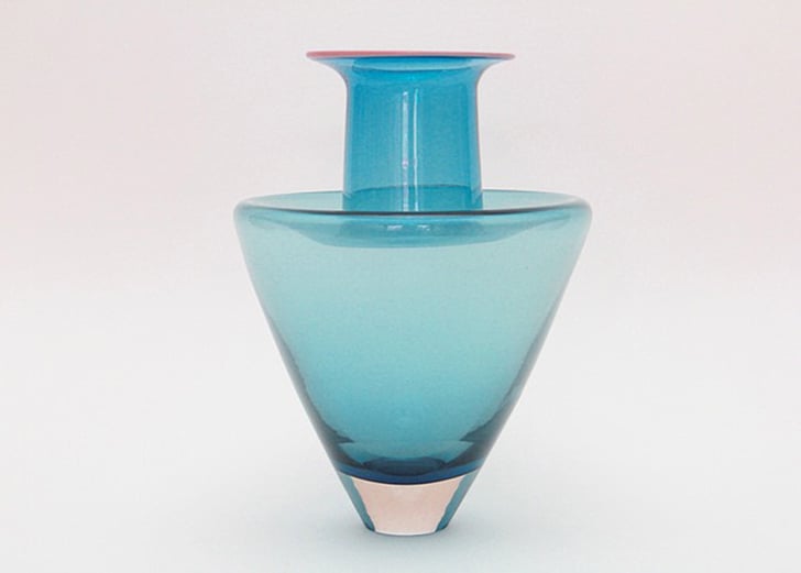 Create Dimension With a Vase How to Decorate Your Bookcase With