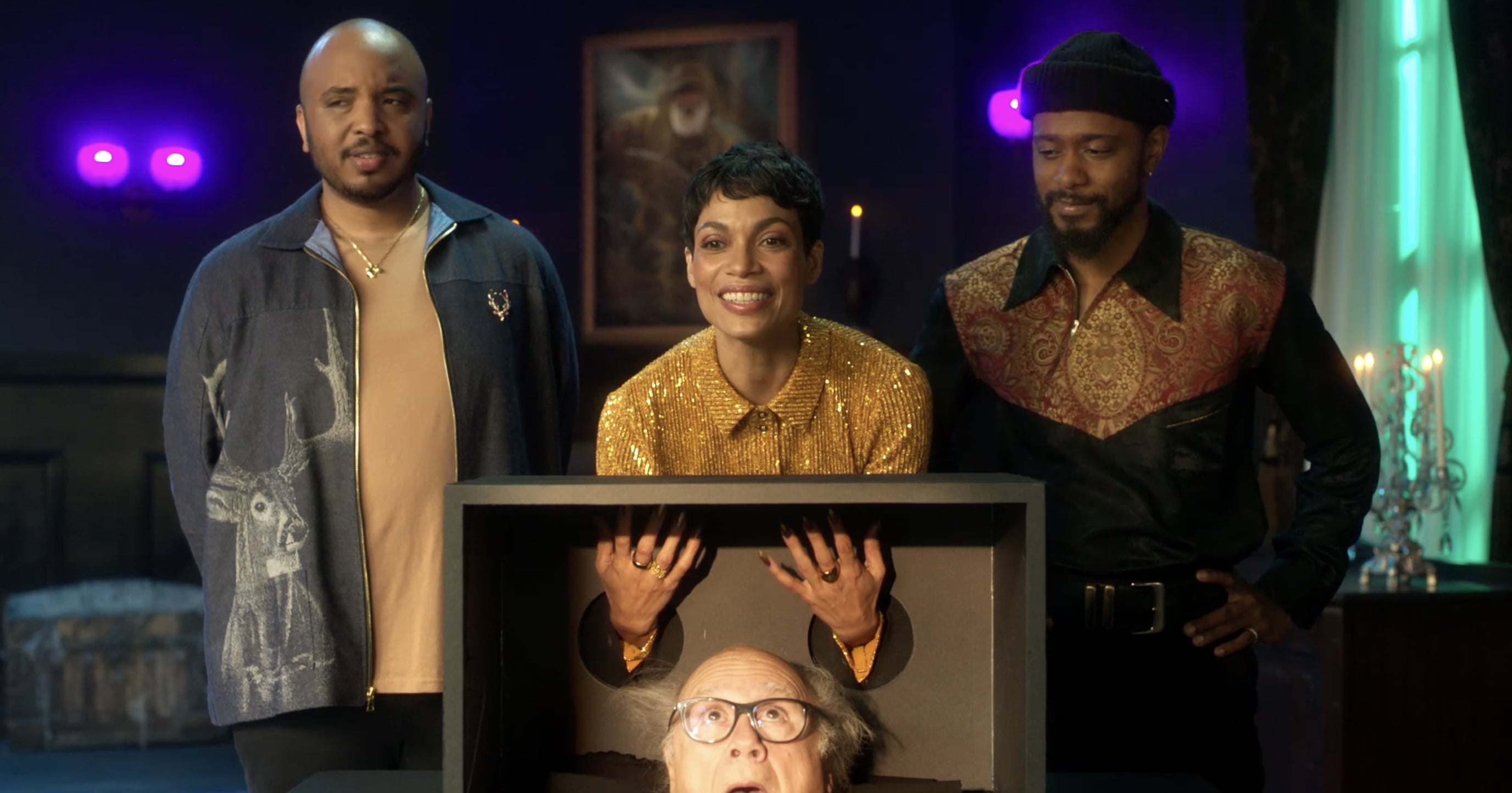 Rosario Dawson Tries to Identify Danny DeVito’s Head in Exclusive “Haunted Mansion” Video