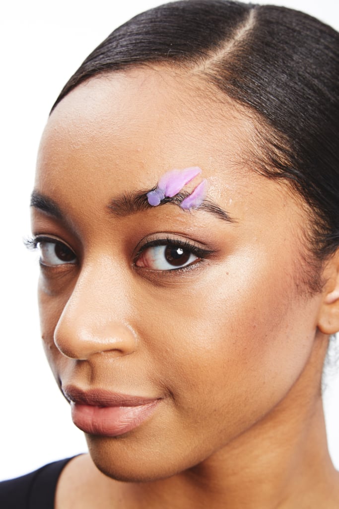 Mold the glue into the shape you want using your fingers. Make sure to put water on your hands to help manipulate the putty-like product. Let the adhesive air-dry or hit it with a blow dryer before covering with makeup.